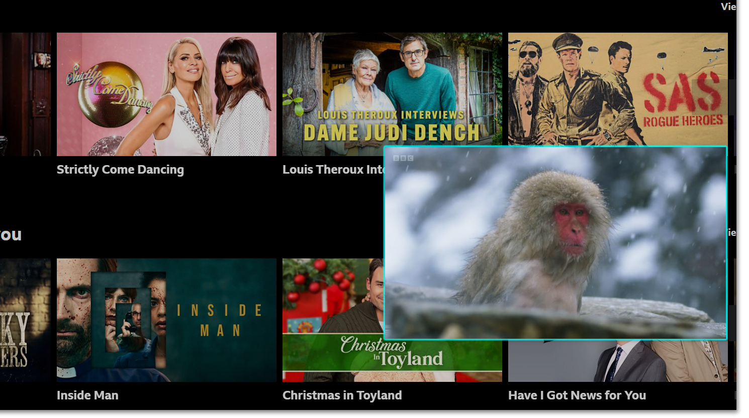 Image showing Picture in Picture mode in use, with the mini screen highlighted. The larger screen is browsing the iPlayer website.