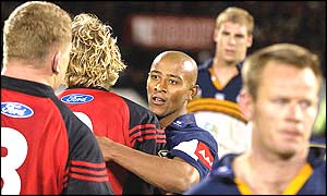 George Gregan congratulates the Crusaders on their win