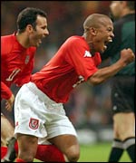 Wales' Ryan Giggs and Rob Earnshaw celebrate beating Germany