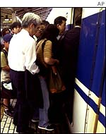 Passengers get on board train at Tokyo