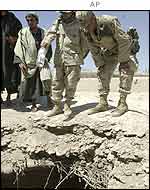 US investigators looking at a hole