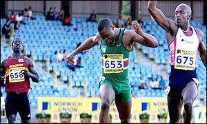 Devonish (right) wins ahead of Campbell (centre), with Chambers (left) some way off the pace