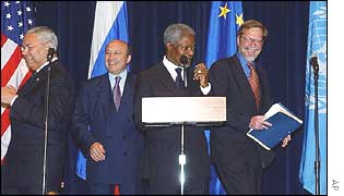 From left, Colin Powell, Russian Foreign Minister Igor Ivanov, the UN's Kofi Annan and Per Stig Moeller of the EU 