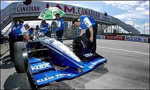 Team Green prepare Franchitti's car in Vancouver