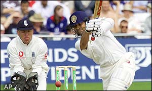 Michael Vaughan takes the vital wicket of Sachin Tendulkar 
