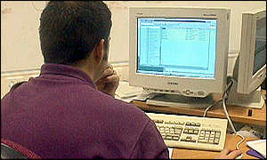 man on computer