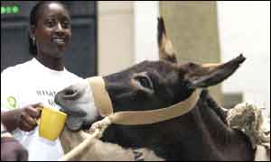 Francesca Arhin from Oxfam leads a protest in the City
