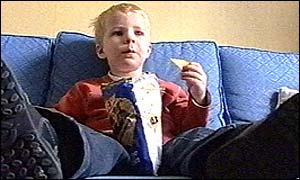 Boy eating crisps