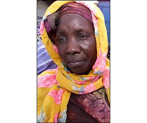 Deouka Camara waits for news of her husband