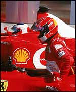 Michael Schumacher (foreground) and Rubens Barrichello after dominating the US Grand Prix