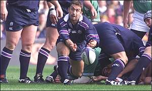 Scrum-half Redpath in action against Ireland