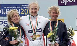Deena Drossin, Paula Radcliffe and Colleen De Reuck on the podium after the senior womens long race during the IAAF world cross country which Radcliffe won 