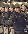 Russian soldiers gather outside the Moscow theatre