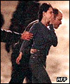 A hostage is evacuated from the theatre 