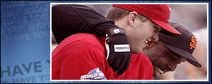 Anaheim's Troy Glaus (left) and San Francisco's Barry Bonds could decide the series 