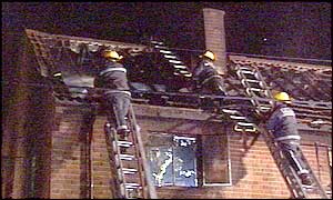 Crews check the roof