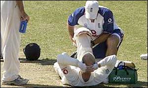 John Crawley receives treatment from the England physio