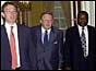 Tony Blair with Martti Ahtisaari (c) and Cyril Ramaphosa (r)
