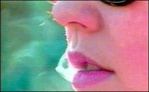 Woman exhaling