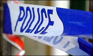 Police tape at scene of accident