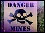 Photograph of landmine warning