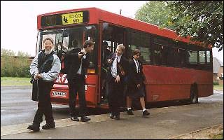 A bus and school children