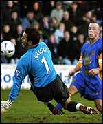 Wright saves from Rodgers