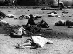 People lie dead and injured at the scene