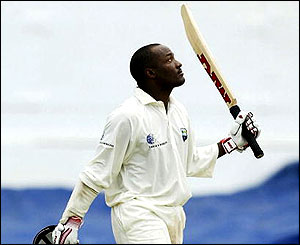 Brian Lara celebrates his century
