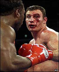 With Klitschko's face badly cut the referee stops the fight