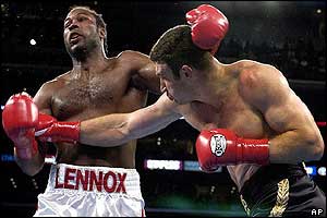 Klitschko staggers Lewis as the fighters trade heavy blows