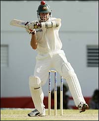 Glenn McGrath brings up the rear for Australia but has little impact