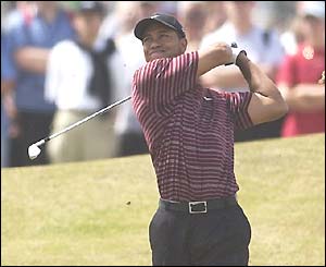 Tiger Woods drives