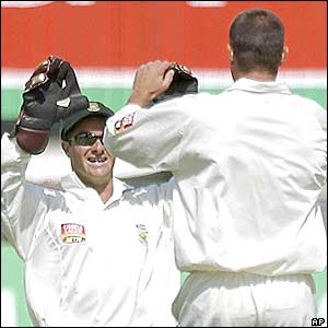 Boucher celebrates with Andrew Hall after Hall removes Andrew Flintoff