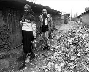 Henry and Monica visiting the sick