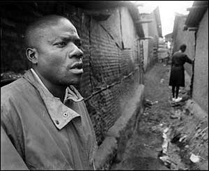 Henry waits outside while Monica visits a client