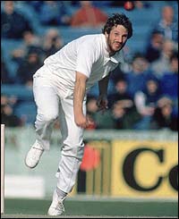 Ian Botham bowls during the fifth Test at Old Trafford in 1981