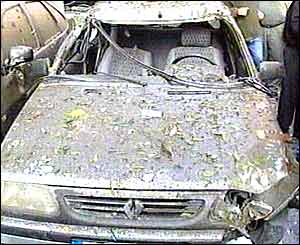 Wrecked car after blast
