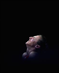 Poland's Aleksandra Klejnowska drops a weight