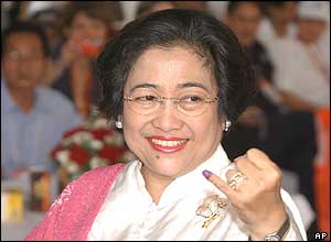 Indonesian President Megawati showing ink-stained finger
