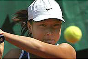 Chinese rookie Jie Zheng shocks French 31st seed Emilie Loit 