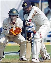 Harbhajan Singh plays a defensive stroke