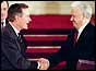 President George Bush and his Russian counterpart Boris Yeltsin shake hands