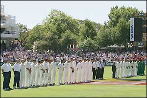 The players and crowd remember those killed in Asia on Boxing Day