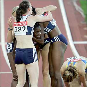 The women's 4x400m relay team celebrate