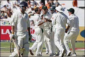 Robert Key returns to the pavilion as South Africa's players celebrate