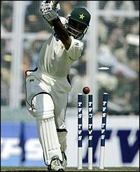 Pakistan's Taufeeq Umar is dismissed by Laxmipathy Balaji