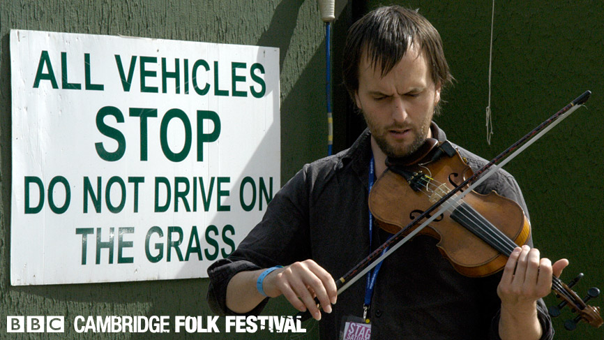 Despite the huge warning sign behind him...