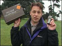 Chris Packham with a geocache and GPS