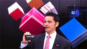 Man demonstrates LG 3D phone at Mobile World Congress
